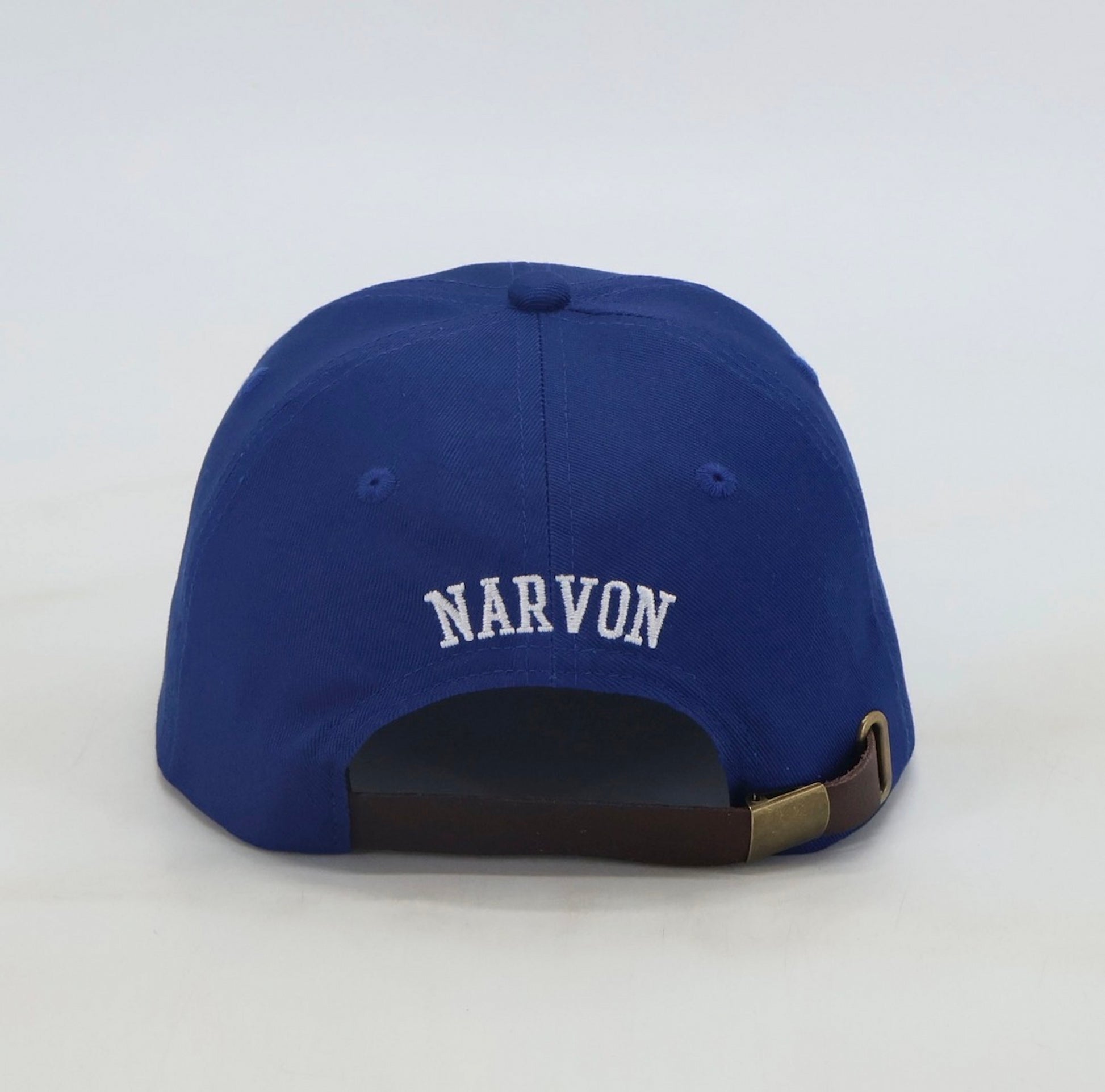 Men’s royal blue dad cap with leather strapback and embroidered logo shown from the back