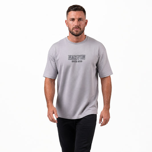 Mens grey t shirt styled in a casual everyday outfit with relaxed fit and clean look
