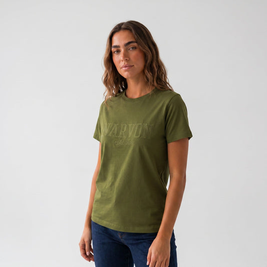 Woman wearing olive green cotton t-shirt with relaxed fit in a casual everyday style