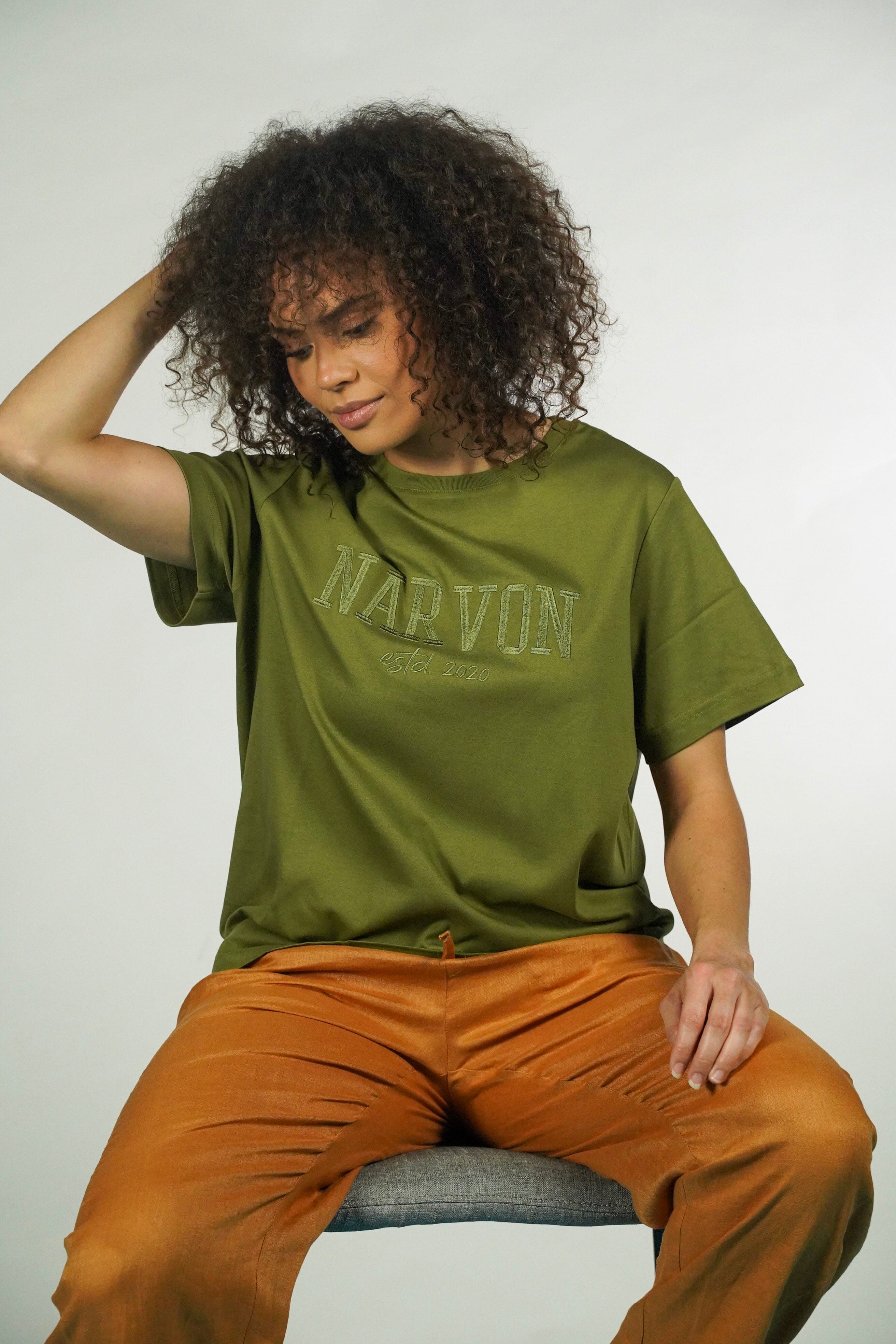Narvon women's olive green premium cotton tee, relaxed female cut in mercerized fabric.